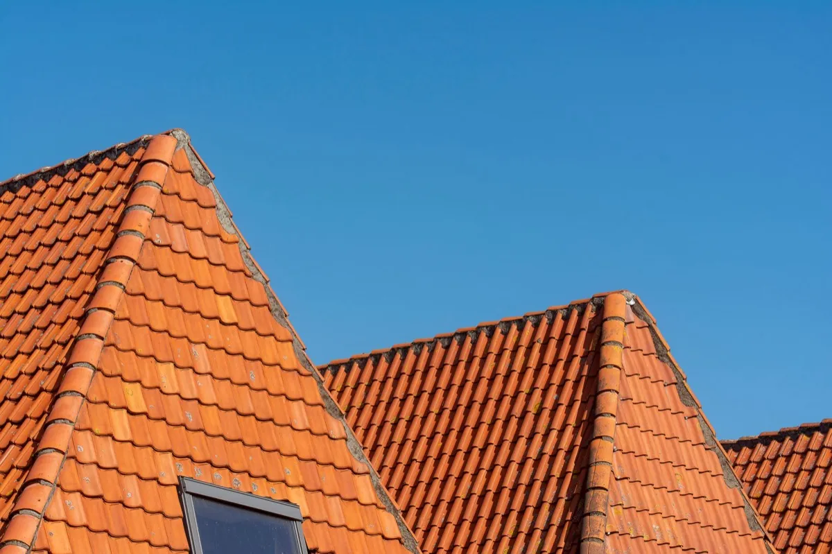 Clay barrel tile rooflines on homes in Schenectady, NY